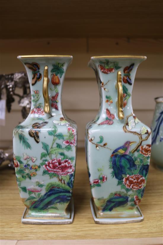 Two famille verte vases, two blue and white Chinese vases, a dish and a carved stand